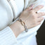 MBSS211 STAINLESS STEEL TWO TONE OVAL CHAIN LINK BRACELET